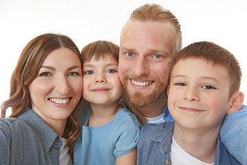 Happy family taking selfie isolated on white