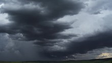 Low Gray Clouds Darkening Above The Prairie, Time Lapse