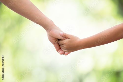 baby walking with hands up