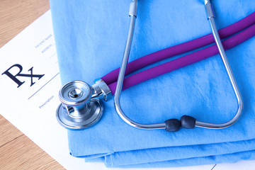 Stethoscope on a background of medical coat