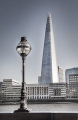 Poster - City of London and Shard of glass building. View from the South bank of the river Thames at sunset. 