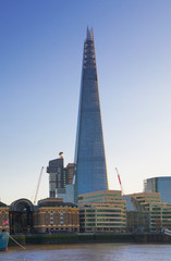 Poster - City of London and Shard of glass building. View from the South bank of the river Thames at sunset. 