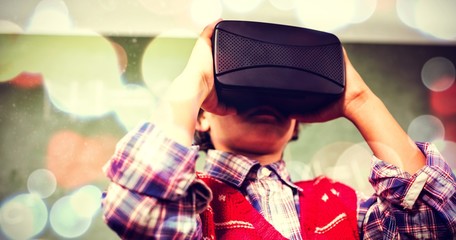 Canvas Print - Boy using a virtual reality device