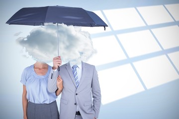 Poster - Composite image of business people holding a black umbrella