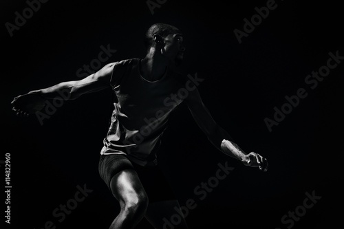 Fotomural Composite image of athlete man throwing a discus