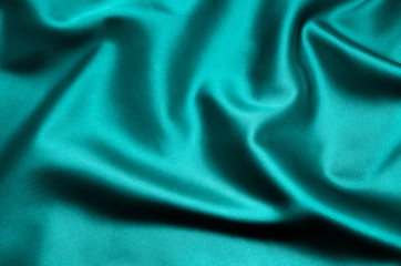 Sticker - Green satin fabric as background