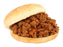 Sloppy Joe Sandwich In A Sesame Seed Covered Bread Roll Isolated On A White Background