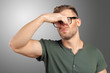 © fotofabrika - portrait of disgusted man pinches nose with fingers hands looks with disgust something stinks bad smell