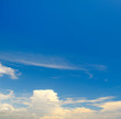 © alinamd - blue sky and white cumulus clouds