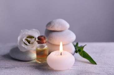 Poster - Spa composition with candle on gray background