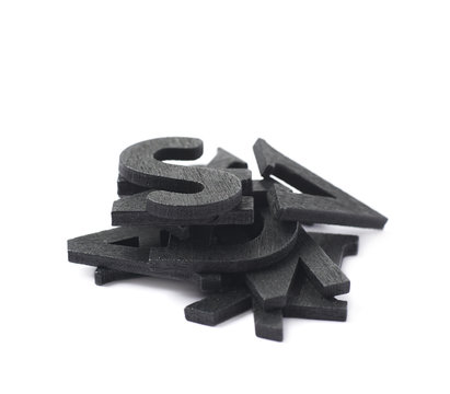 Pile of painted wooden letters isolated