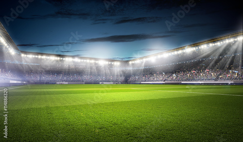 Obraz Dibond Stadion piłkarski w świetle. różne środki przekazu