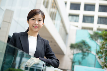 Wall Mural - Businesswoman standing at outdoor