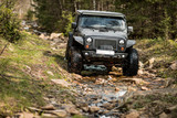 off-road extreme expedition on black jeep wrangler