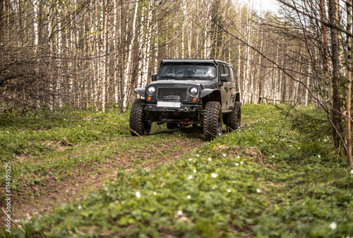 off-road extreme expedition on black jeep wrangler Poster