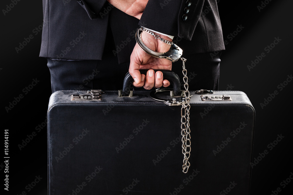Leather wrist chained suitcase Stock Photo | Adobe Stock