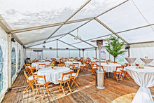 Tables And Chairs In The Big Tent