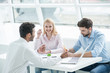 © Yakobchuk Olena - Young designers at work in office