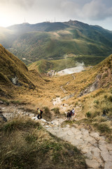 Traveller enjoy hiking to the peak of highest mountain in Taipei