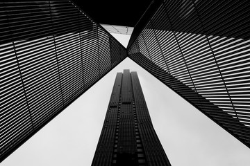 melbourne cbd architecture - metal scultpture and skyscraper in black and white