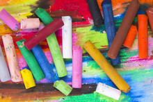 oil pastels crayons on colorful background
