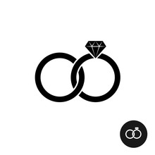Wedding Rings Simple Black Icon. Two Crossed Rings With Diamond.