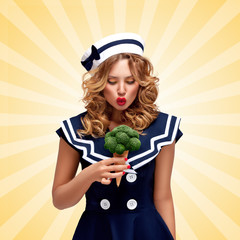 Love green / Pin-up sailor girl eating broccoli ice cream on a waffle cone on cartoon style background.