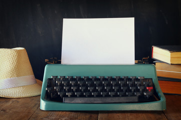 Wall Mural - Photo of vintage typewriter with blank page