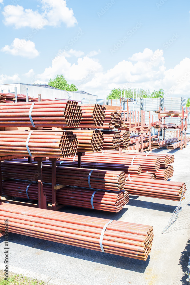 Stack Pipe Material Loading Stack of steel pipes for scaffolding in stock. Stock Photo | Adobe Stock