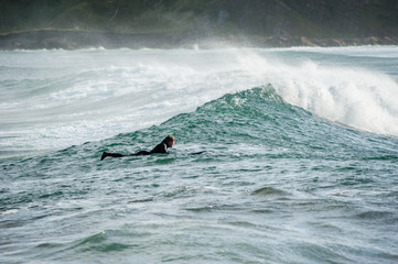 Surfers at Cullen