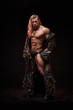 © kazanovskyiphoto - Man with sexy strong muscular body dressed in costume monster