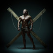 © kazanovskyiphoto - Sexual naked man, muscular, hands tied rope to wooden beams