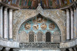 Details of the medieval Venice's San Marco Basilica facade above the San Alipio door.