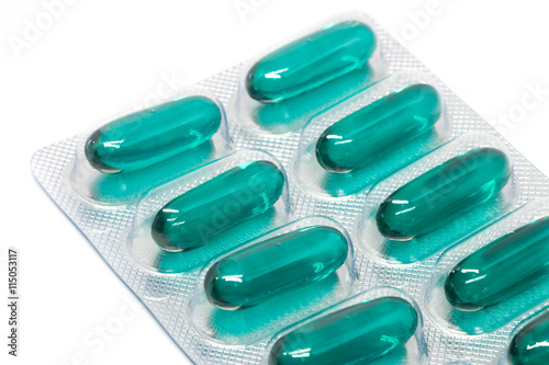 green soft gel capsules pills in blister pack Stock Photo | Adobe Stock