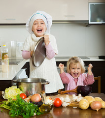 Wall Mural - Children cooking in kitchen