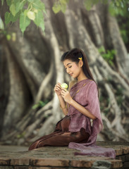 Woman wearing typical Thai dress identity culture of Thailand