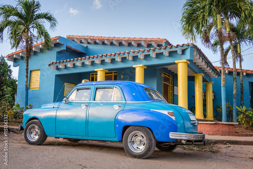 Blue old classic american car in Vinales, Cuba Plakát