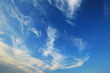 © aphichetc - Blue sky with fluffy clouds background