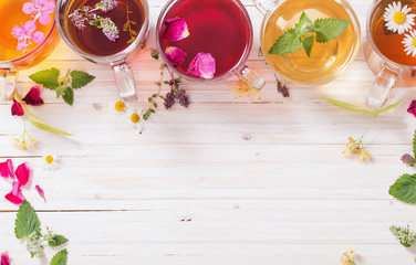 herbal tea on a white wooden background