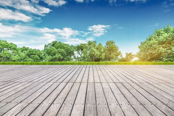 Sticker - empty wooden floor with modern building in city