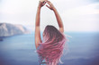 © Alena Ozerova - Woman with pink hair over sea