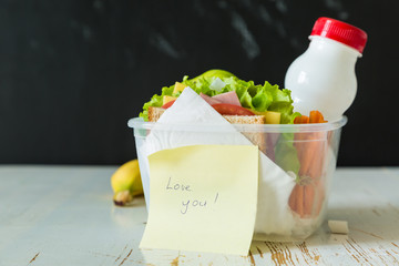 Wall Mural - Lunch box with sandwich and fruits