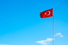 Turkey Flag In Blue Sky Background