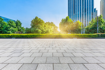 Poster - empty pavement front of modern architecture