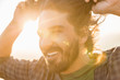 © Connect Images - Man against glaring sun
