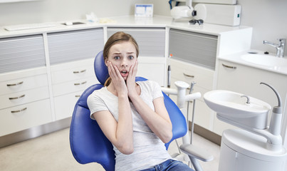 Sticker - scared and terrified patient girl at dental clinic