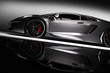 © Photocreo Bednarek - Grey fast sports car in spotlight, black background. Shiny, new, luxurious.