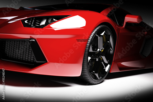 Obraz na plátne Red fast sports car in spotlight, black background