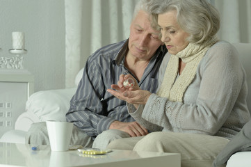 Wall Mural - sick Elderly  couple  with pills