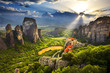 Greece. Meteora - incredible sandstone rock formations. The Holly Monastery of Rousanou and St. Nikolaos Anapafsas Monastery in the background. The Meteora area is on UNESCO World Heritage List